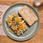 Gordon Ramsay chicken salad sandwich: a baguette filled with five-spice chicken salad, honey mustard slaw, mandarin orange segments, cashews and crispy wonton strips