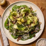 Gordon Ramsay crispy chicken salad: a whole butter lettuce opened like a flower with hoisin-glazed crispy shredded chicken, pickled daikon, ginger and scallions