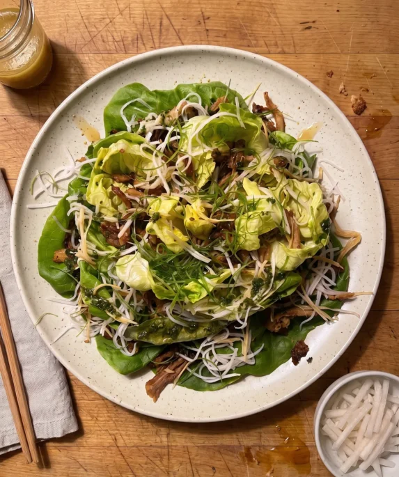 Gordon Ramsay crispy chicken salad: a whole butter lettuce opened like a flower with hoisin-glazed crispy shredded chicken, pickled daikon, ginger and scallions