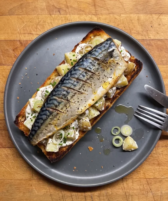 Gordon Ramsay mackerel and potato salad open sandwich: crisp-skinned mackerel fillet on warm potato salad with chives and scallions on toast