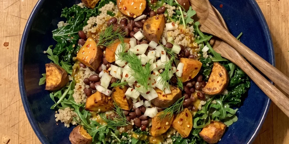 Gordon Ramsay sweet potato salad with roasted sweet potato, aduki beans, quinoa, kale, arugula and fennel in a bowl
